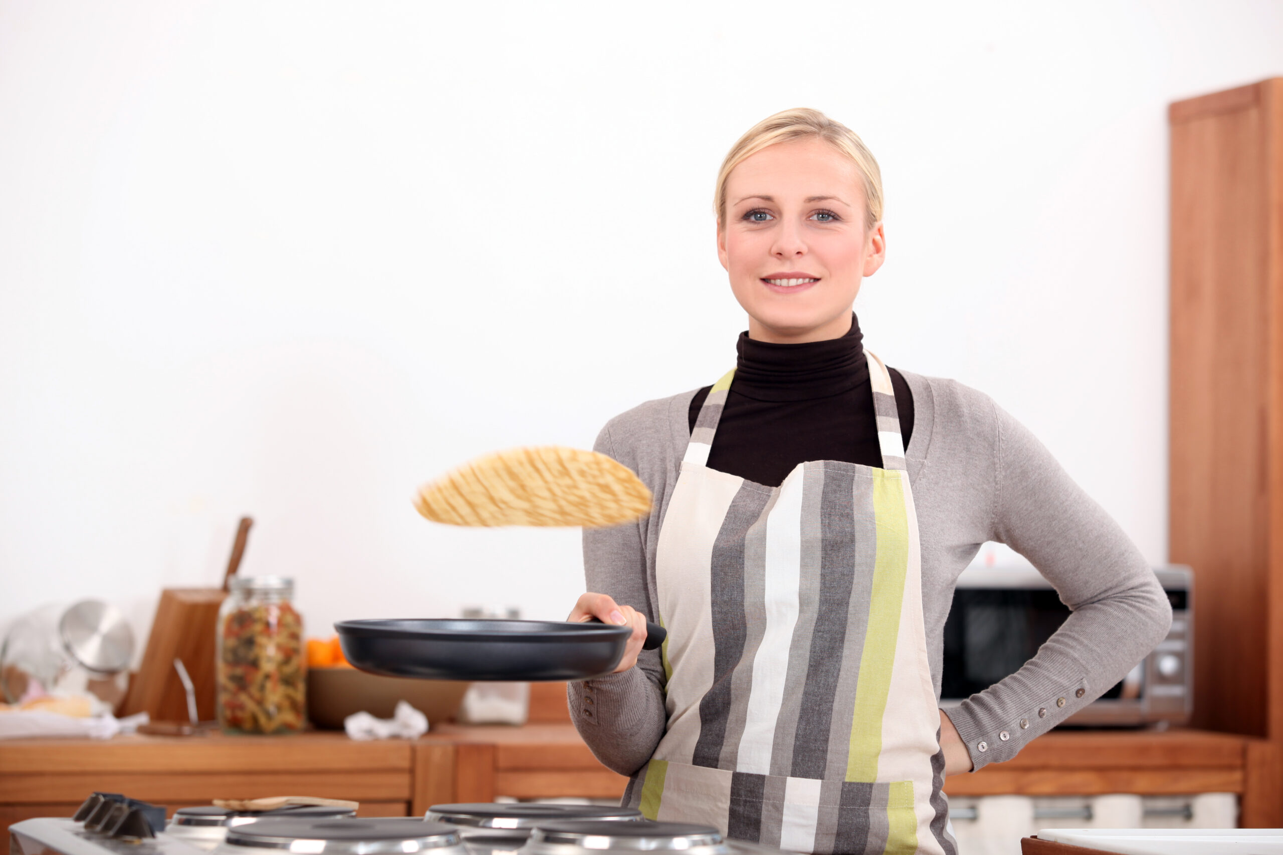 Woman making pancakes